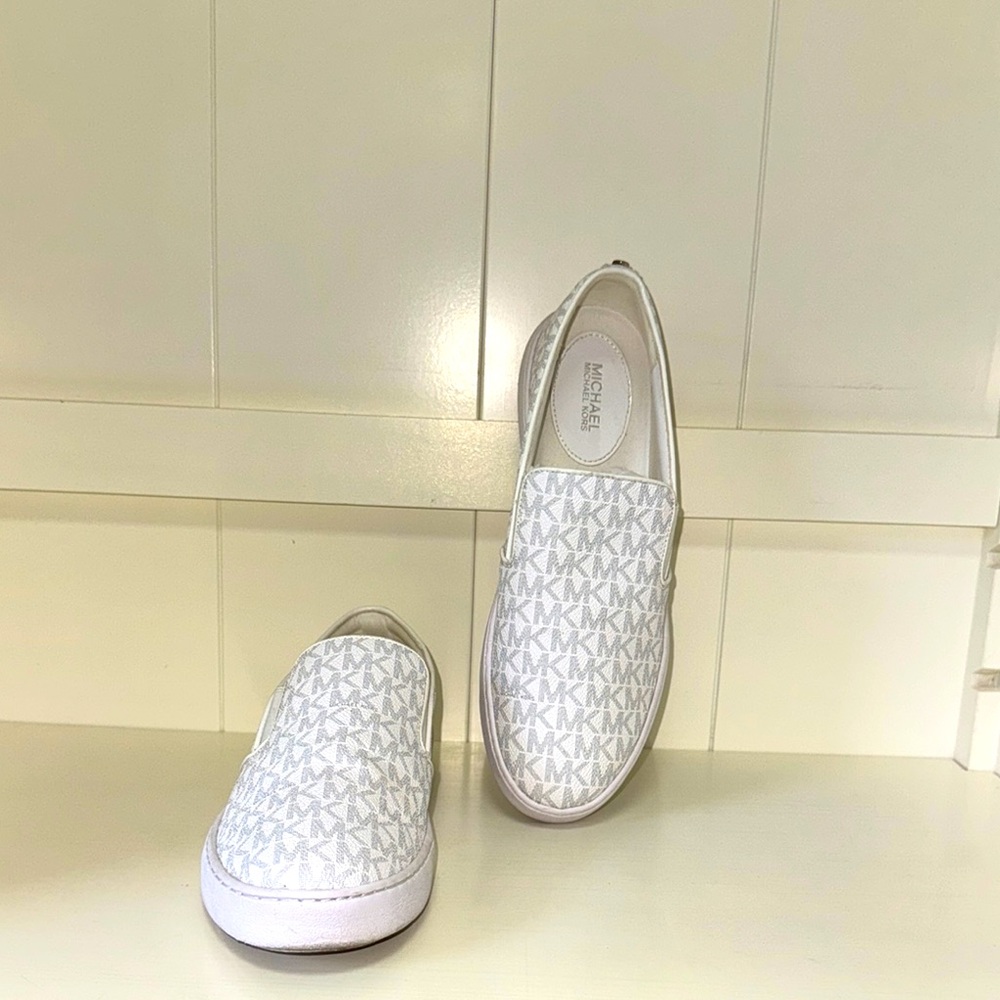 Michael Kors White Slip-On Sneakers with Perforated Design use great condition